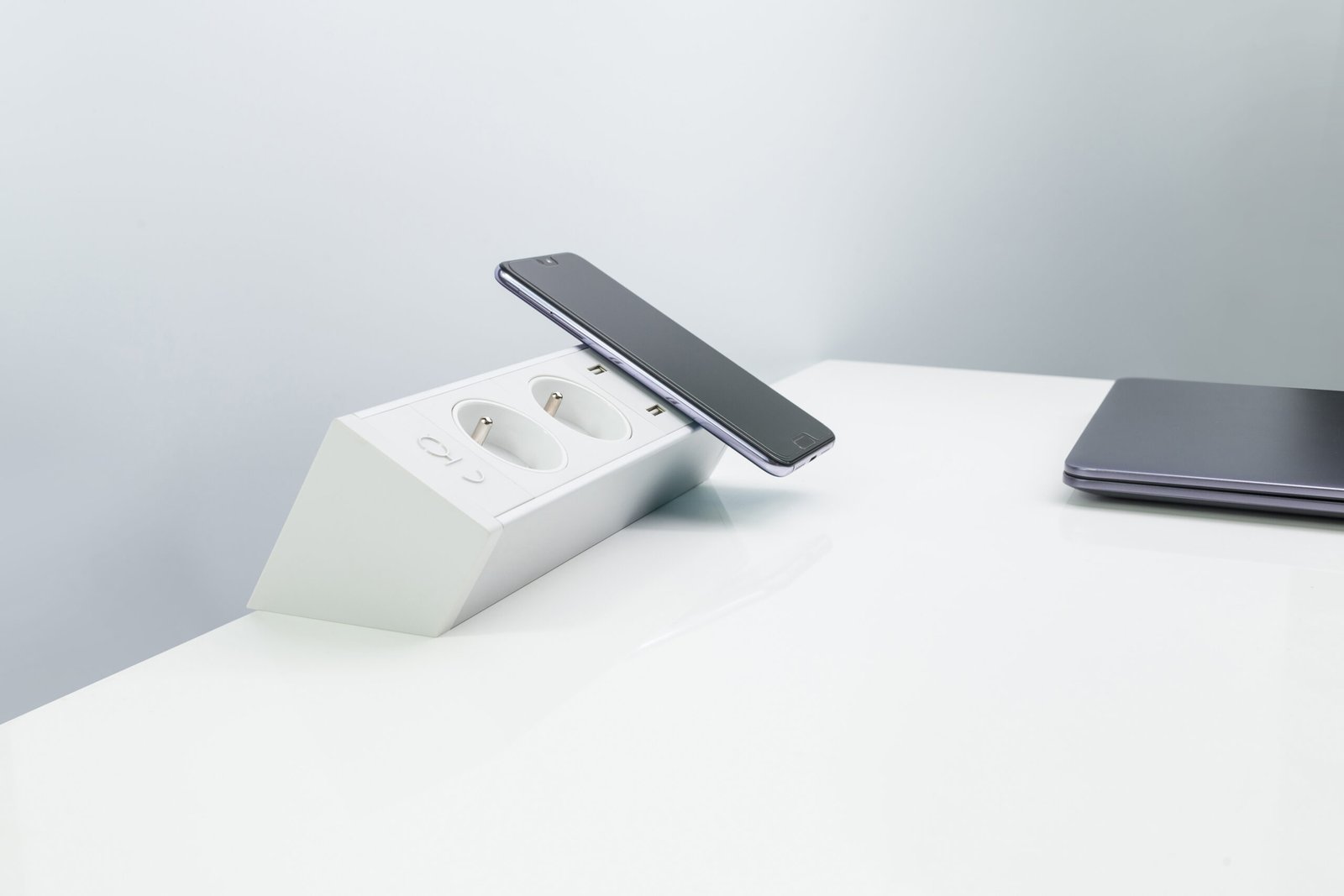 Desktop socket integrated into a work surface for project use