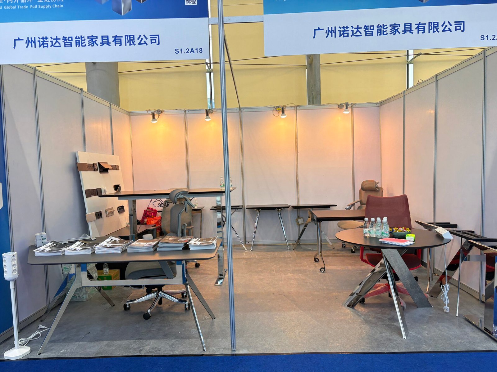 NORDA exhibition booth displaying workplace furniture