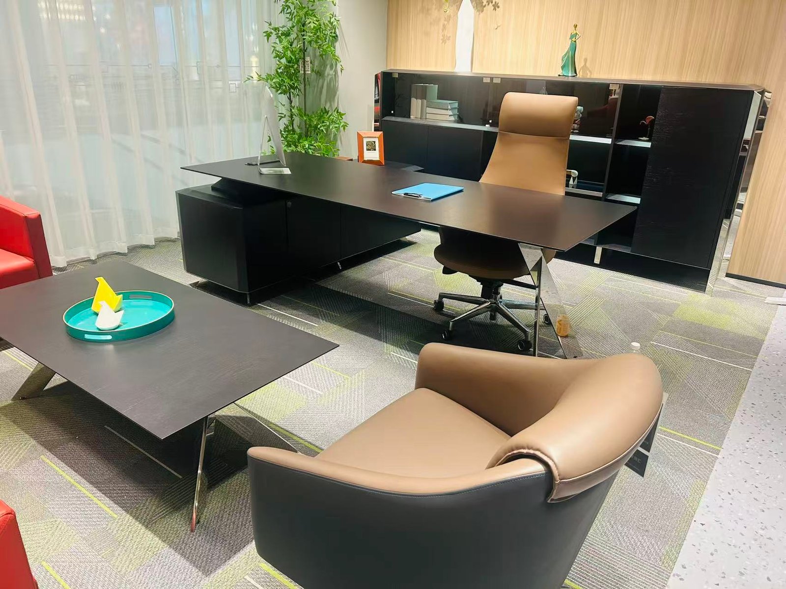 Executive furniture installed with lounge seating and integrated storage