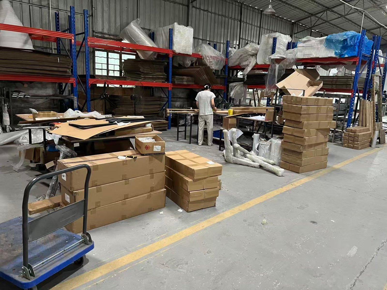 Packed furniture cartons grouped in the workshop