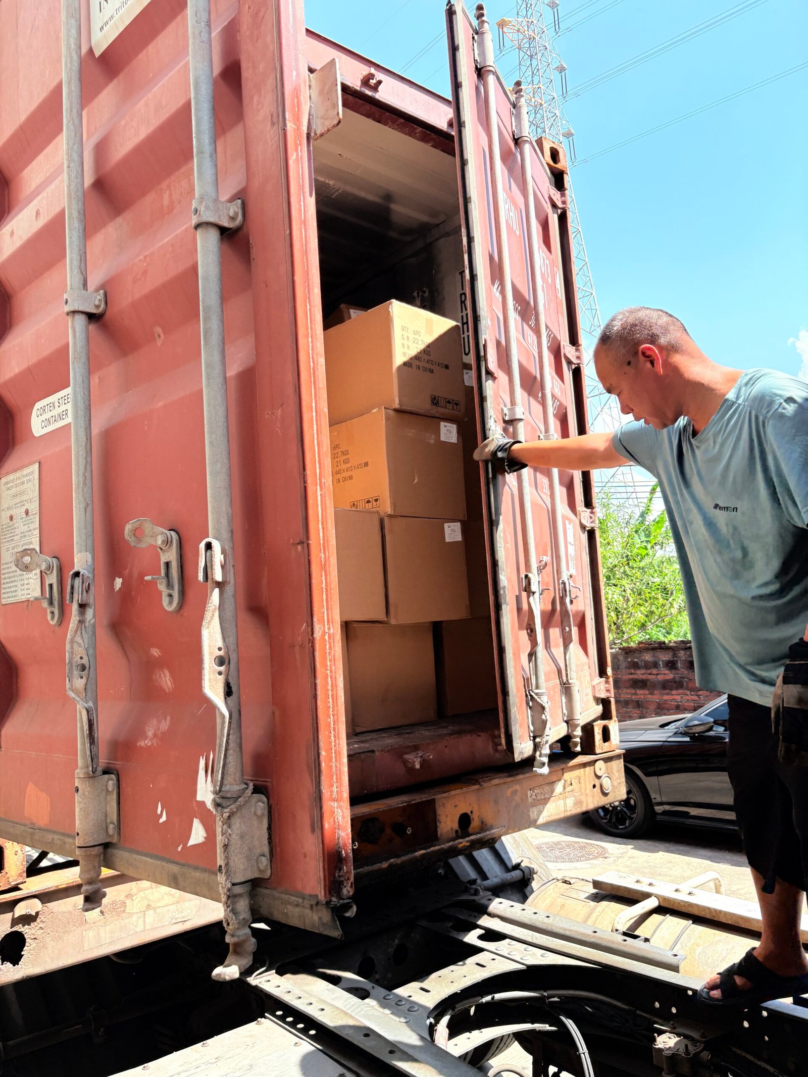 Container doors being secured after loading