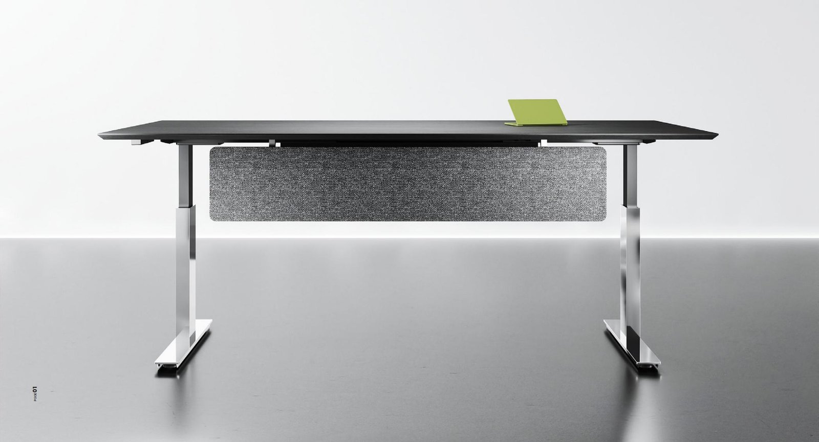 Close view of a lift column and T-foot support beneath the desk