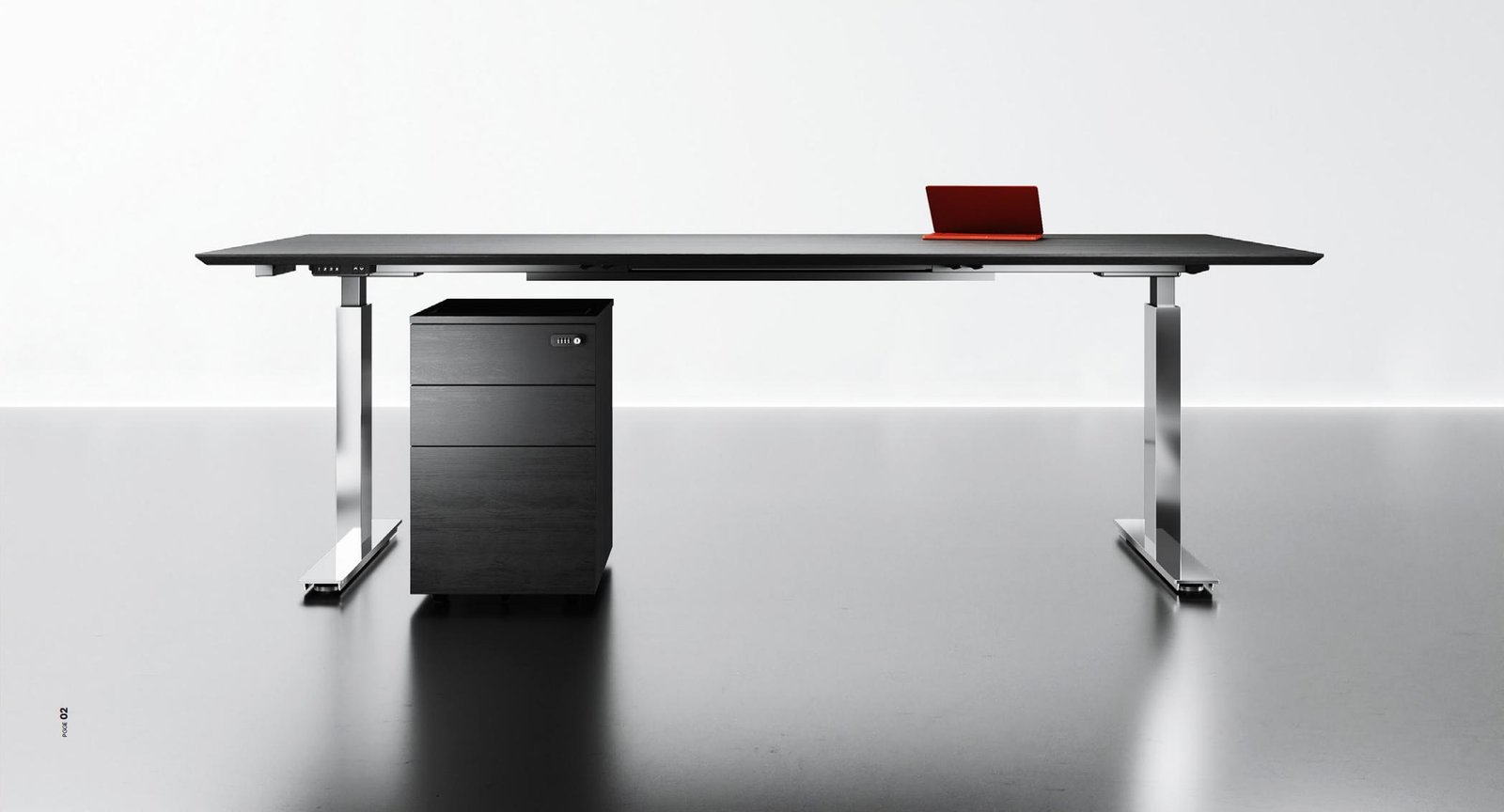 Executive desk shown with nearby mobile storage for spatial planning