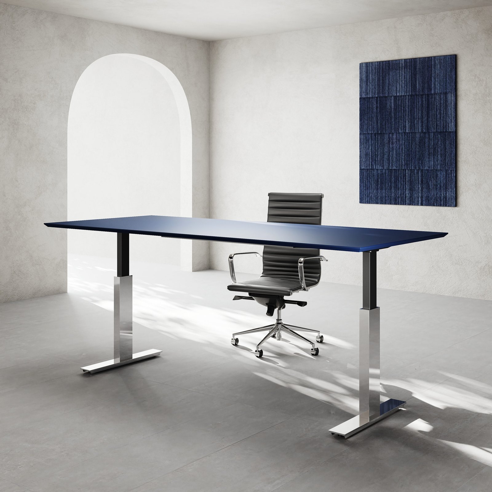 Norda stainless steel height adjustable executive desk in an architectural office setting